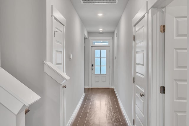 doorway to outside with dark hardwood / wood-style flooring