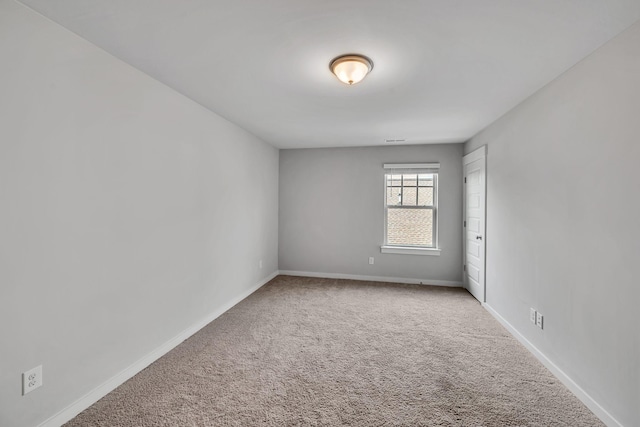 unfurnished room with carpet