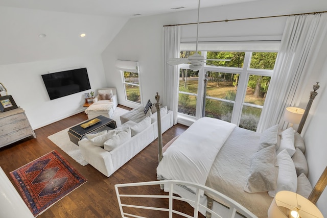 bedroom with dark hardwood / wood-style flooring and vaulted ceiling