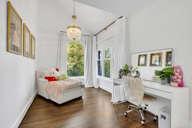 bedroom featuring vaulted ceiling, dark hardwood / wood-style flooring, and an inviting chandelier