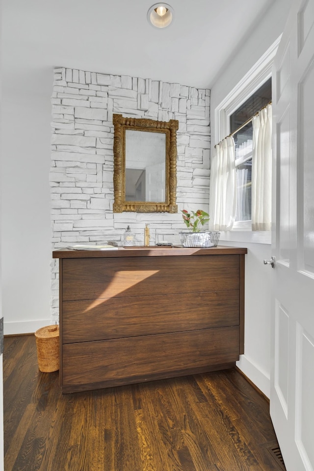 bathroom featuring hardwood / wood-style flooring