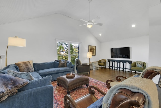 living room with ceiling fan, high vaulted ceiling, and wood-type flooring