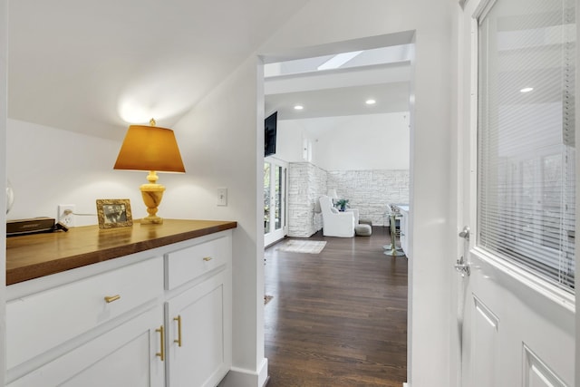 hallway featuring dark hardwood / wood-style floors