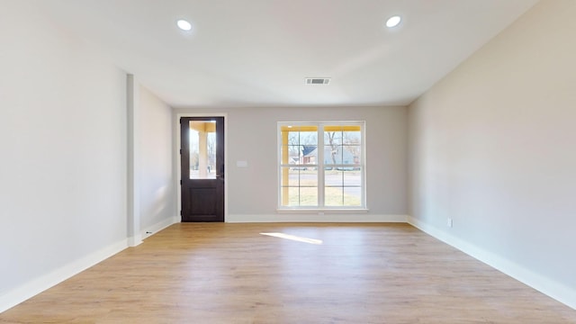 foyer with light hardwood / wood-style flooring