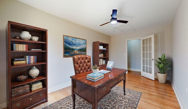 office area with ceiling fan, light wood-type flooring, and french doors