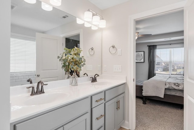 bathroom with vanity and ceiling fan