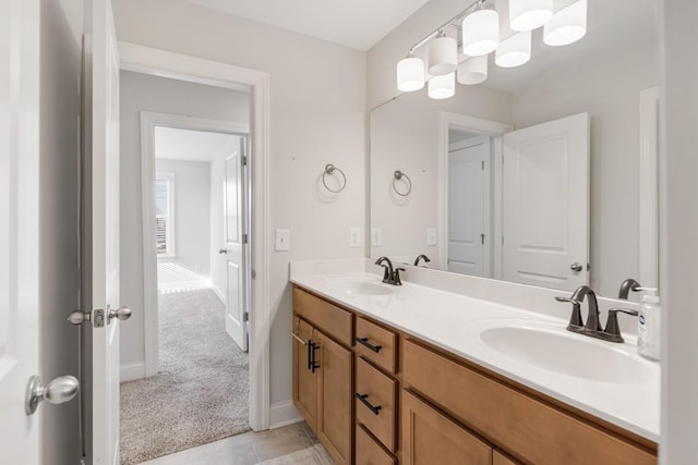 bathroom featuring vanity and an inviting chandelier