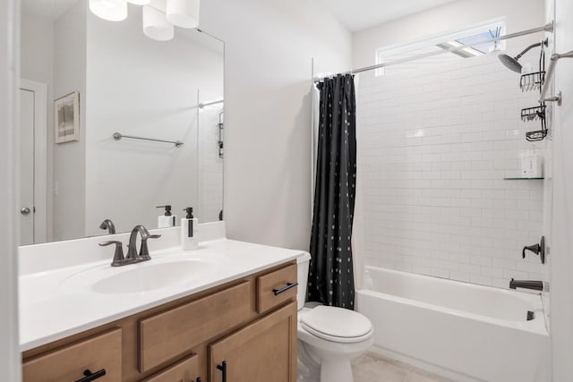 full bathroom featuring vanity, toilet, and shower / bath combo with shower curtain