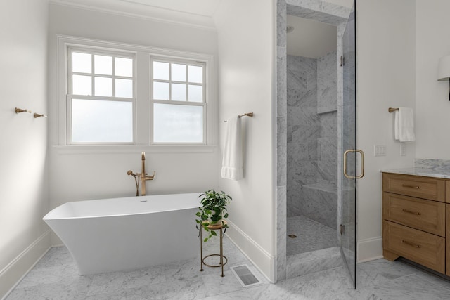 bathroom featuring separate shower and tub and crown molding