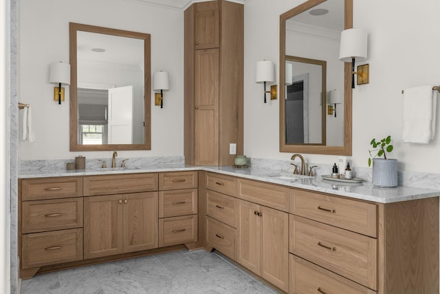 bathroom featuring crown molding and vanity