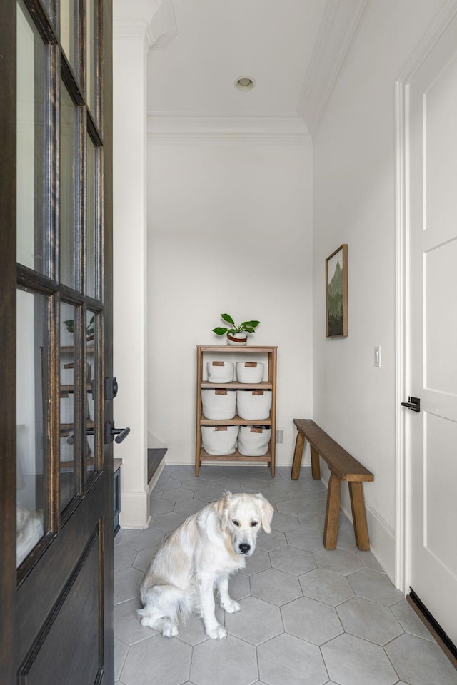 foyer entrance with ornamental molding