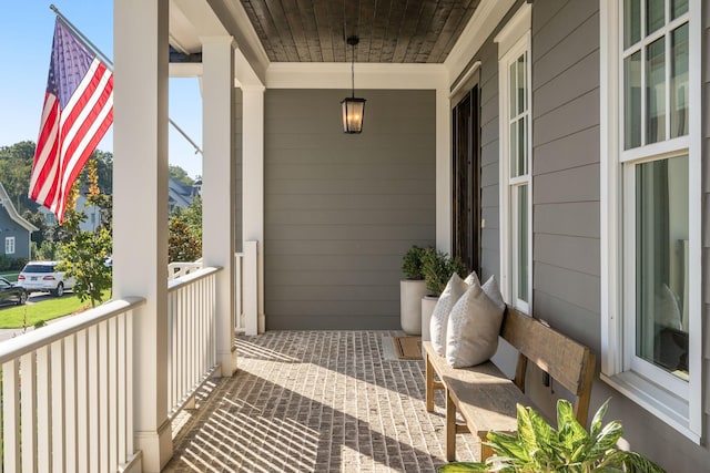 balcony featuring a porch