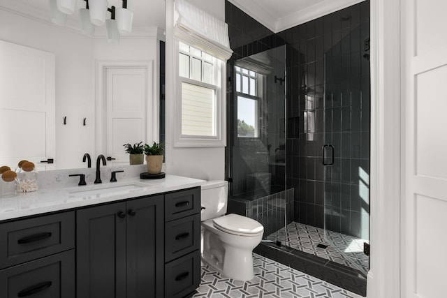 bathroom with walk in shower, tile patterned floors, toilet, vanity, and ornamental molding