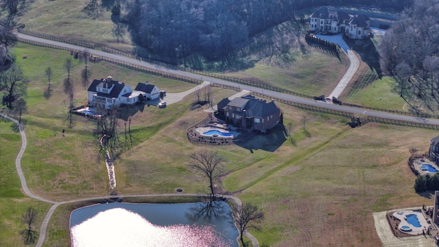 bird's eye view with a rural view and a water view