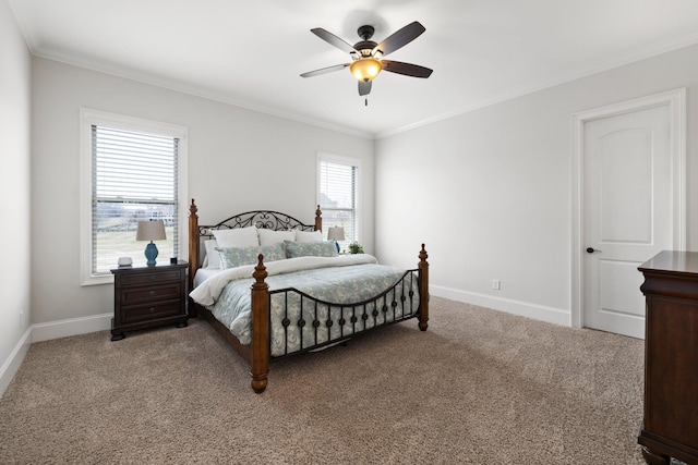 bedroom with crown molding, ceiling fan, and carpet