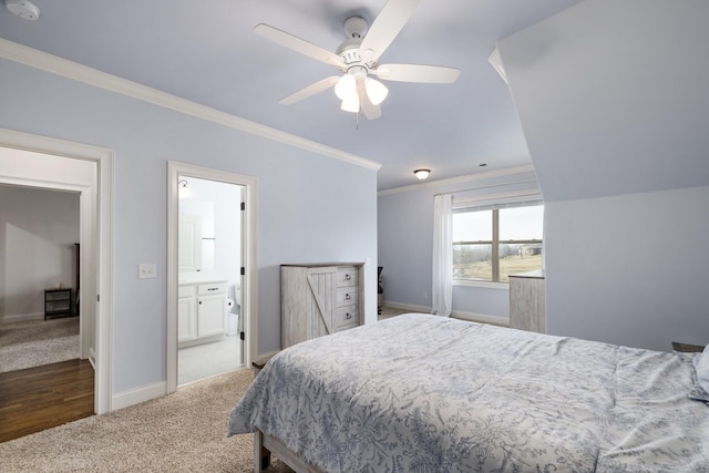 bedroom featuring ornamental molding, carpet flooring, connected bathroom, and ceiling fan