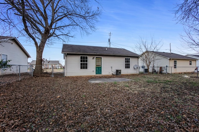 back of property with central AC unit