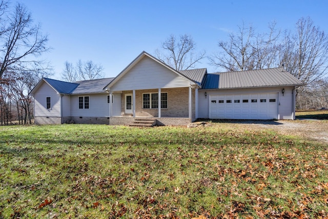 ranch-style home featuring a front yard, a porch, and a garage