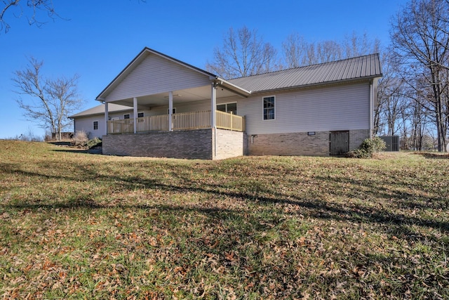 view of property exterior featuring a lawn