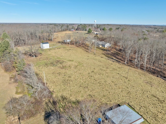 birds eye view of property featuring a rural view