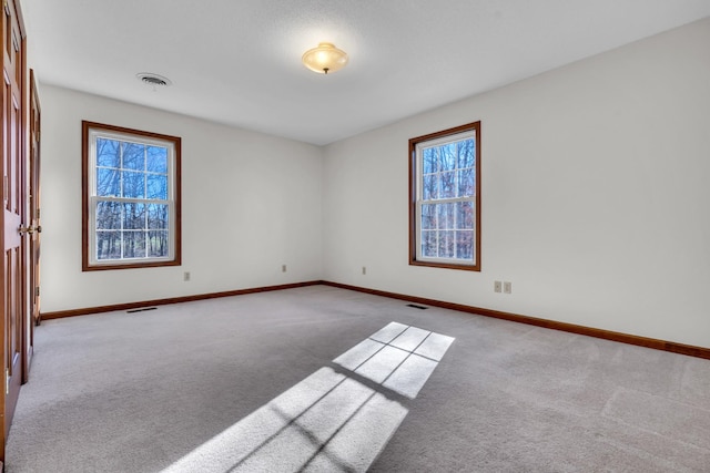 view of carpeted spare room