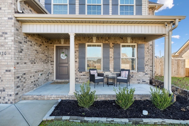 doorway to property featuring a porch