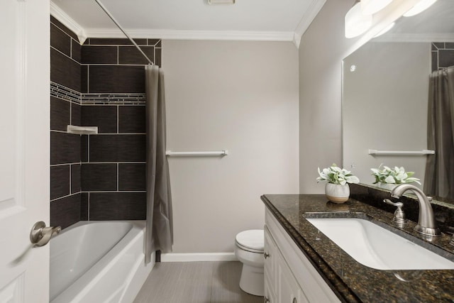 full bathroom featuring tile patterned flooring, toilet, shower / bath combo with shower curtain, vanity, and ornamental molding