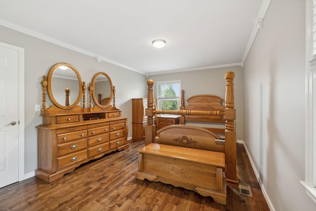 bedroom featuring dark hardwood / wood-style floors and ornamental molding