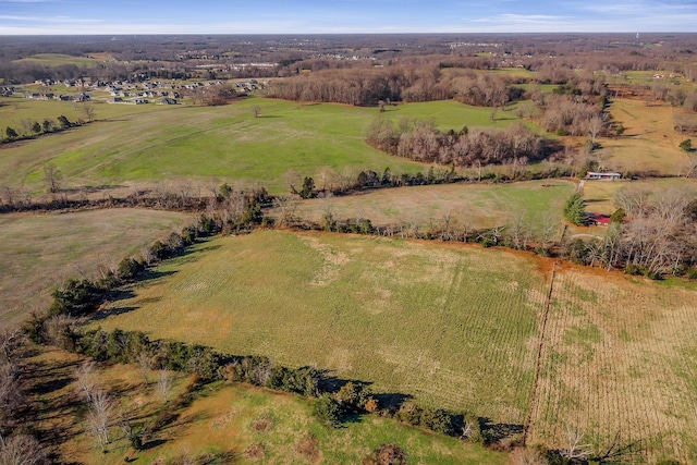 birds eye view of property featuring a rural view