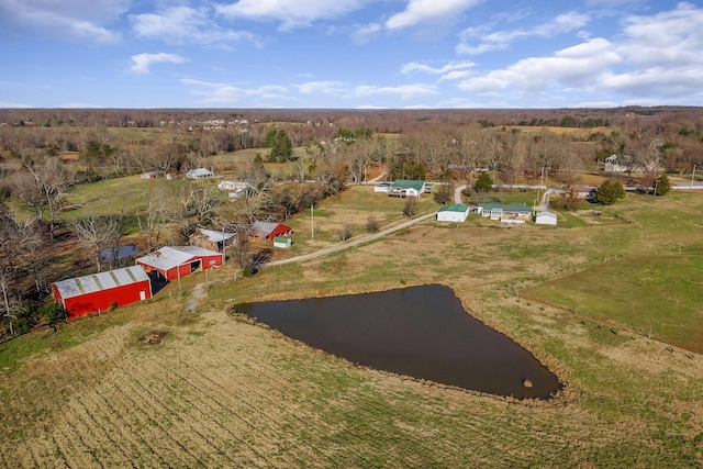 birds eye view of property with a rural view