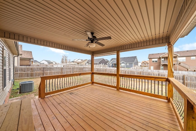 wooden terrace with ceiling fan and central air condition unit