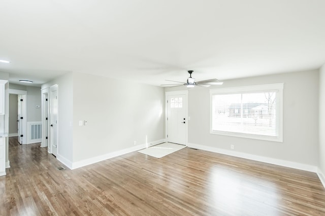 interior space featuring ceiling fan and light wood-type flooring