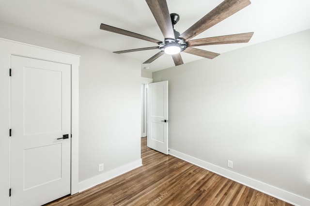 unfurnished bedroom with hardwood / wood-style floors and ceiling fan