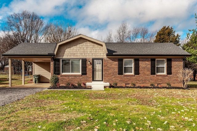 ranch-style home with a carport and a front yard