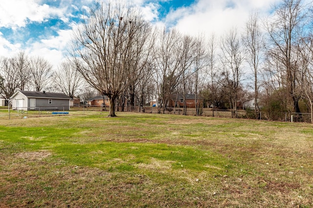 view of yard featuring a trampoline