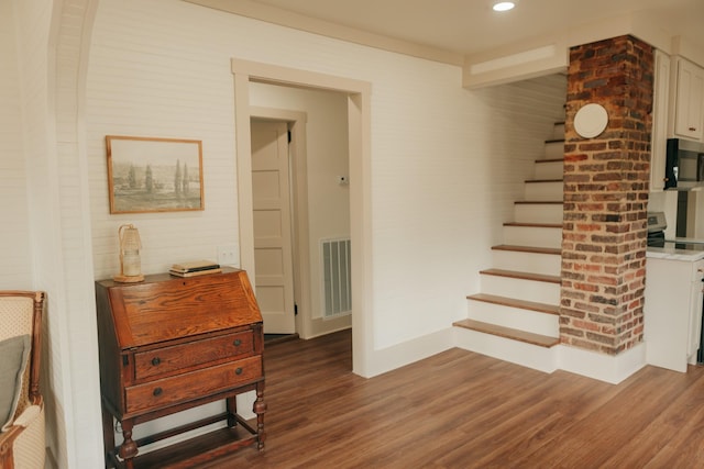 stairway with wood-type flooring