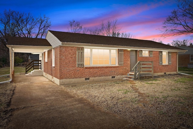 single story home with a carport