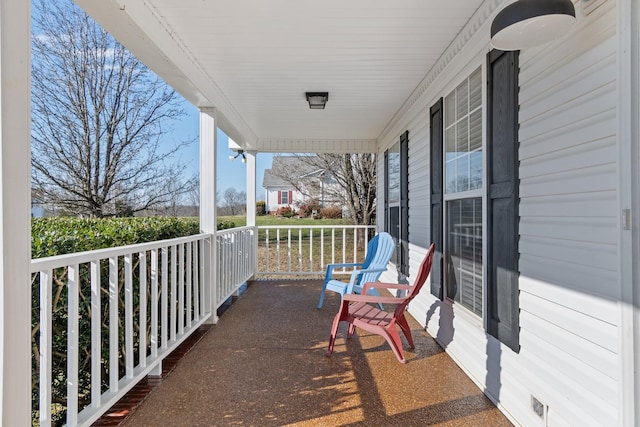 balcony featuring a porch