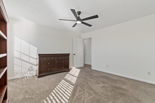 unfurnished bedroom featuring ceiling fan and light carpet