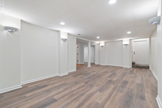 basement with dark wood-type flooring