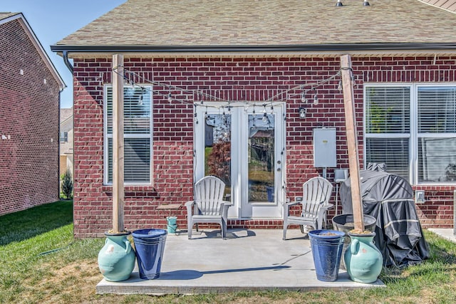 rear view of house with a patio