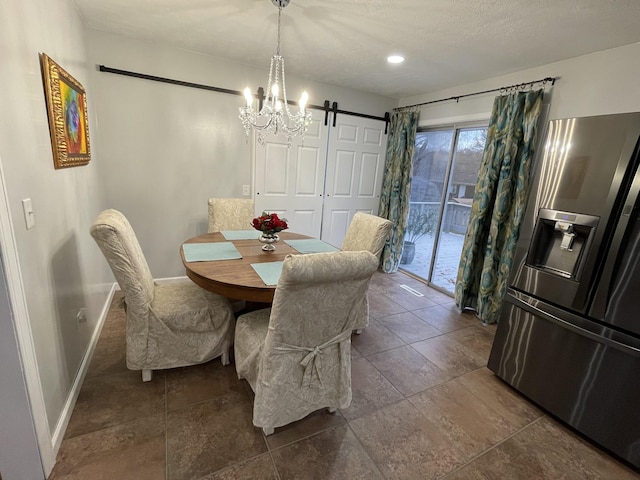 dining room featuring a barn door