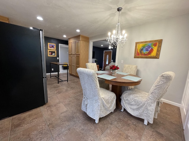 dining area with a chandelier