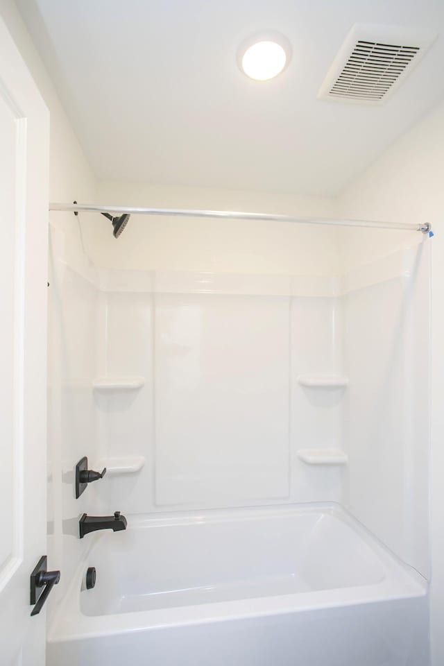 bathroom featuring shower / washtub combination