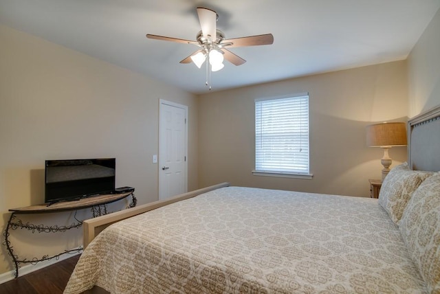 bedroom featuring wood-type flooring and ceiling fan