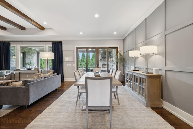 dining space featuring beamed ceiling, dark hardwood / wood-style floors, and crown molding