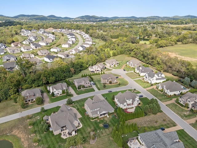 drone / aerial view featuring a mountain view