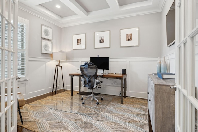 home office featuring french doors, a wealth of natural light, ornamental molding, and coffered ceiling