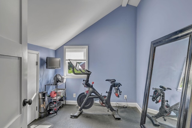 exercise area featuring vaulted ceiling