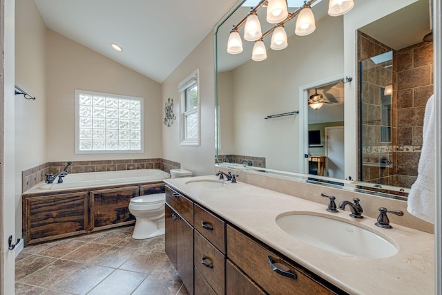 full bathroom featuring vanity, vaulted ceiling, ceiling fan, separate shower and tub, and toilet